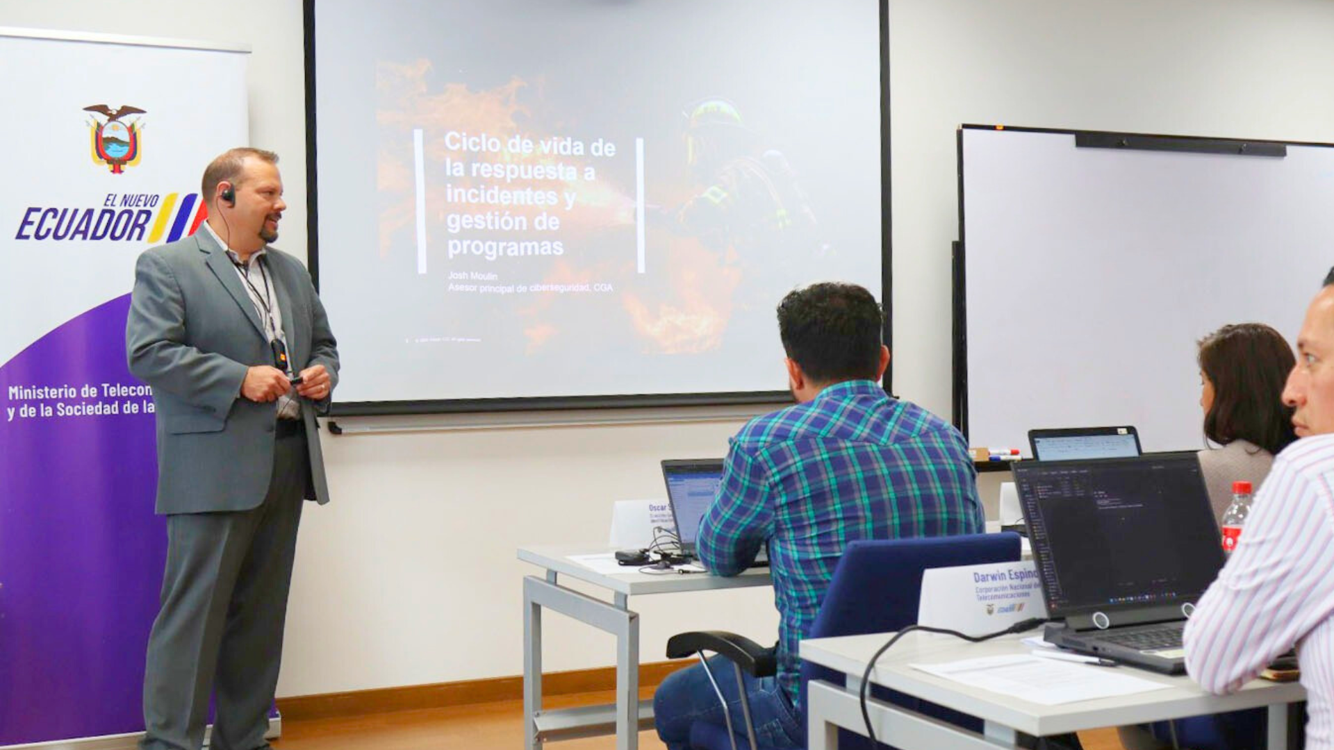 Josh Moulin teaching government officials in Ecuador