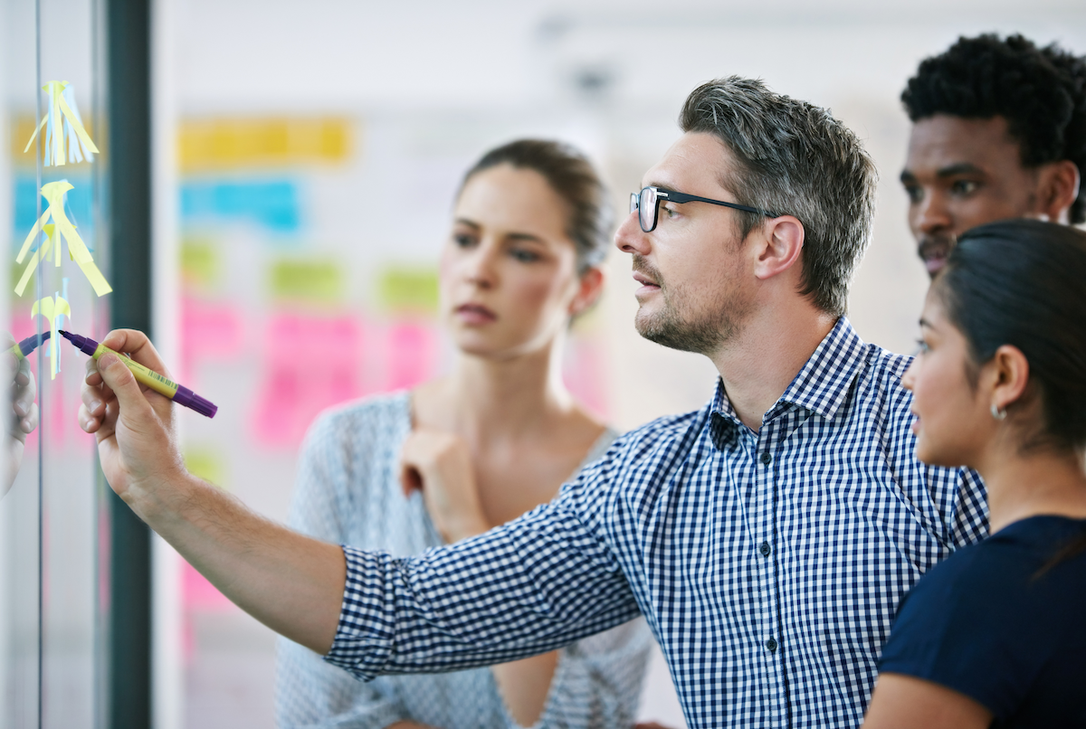 This is a photograph that depicts a business workshop or brainstorming session
