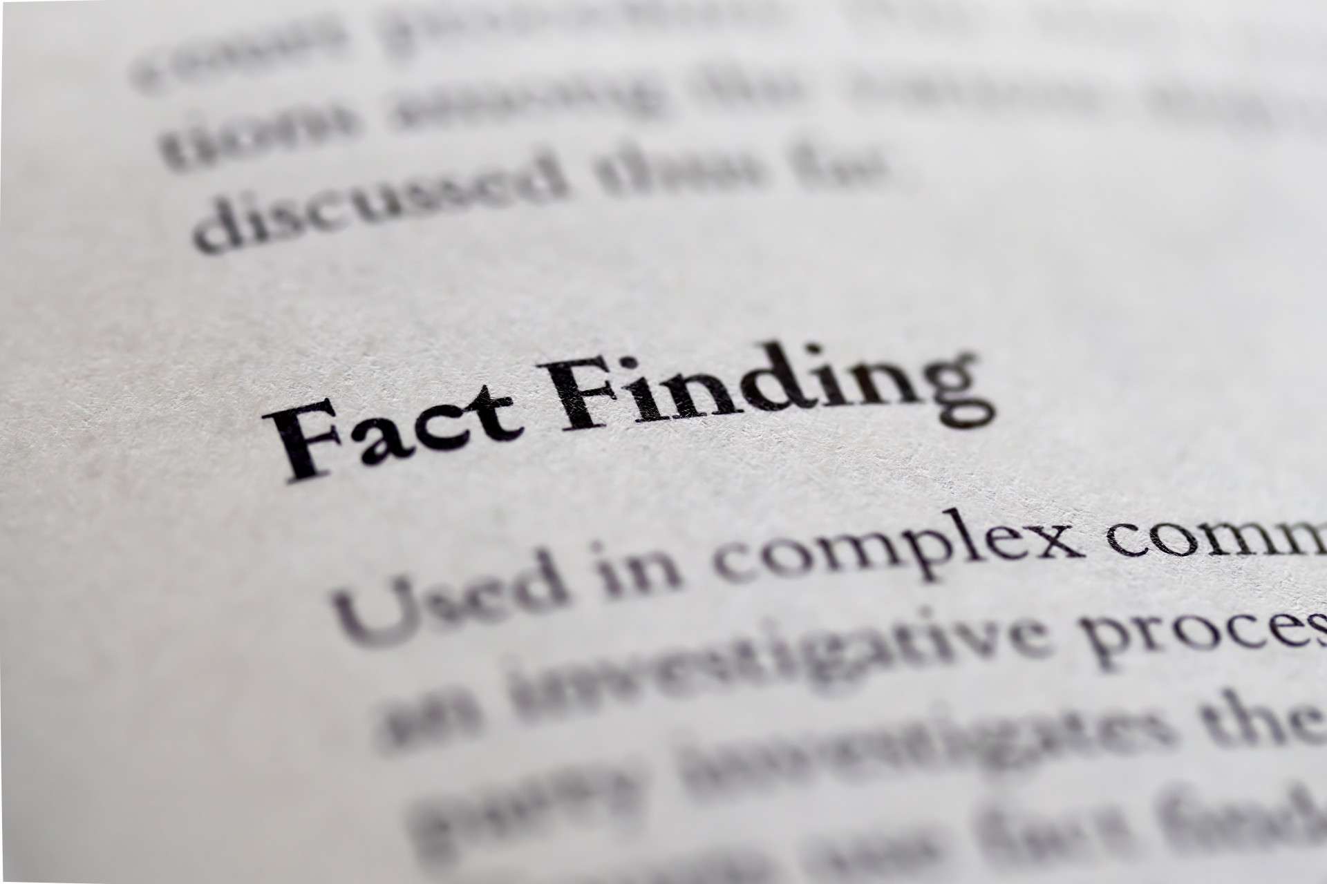  Close-up of a printed page with the bold words “Fact Finding,” representing investigation, evidence gathering, or information verification.